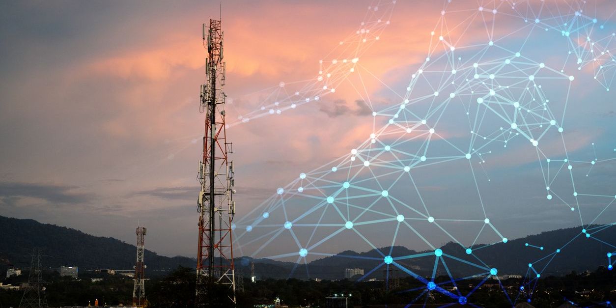 Technology concept for internet and mobile communication - with telecommunication tower in the background.