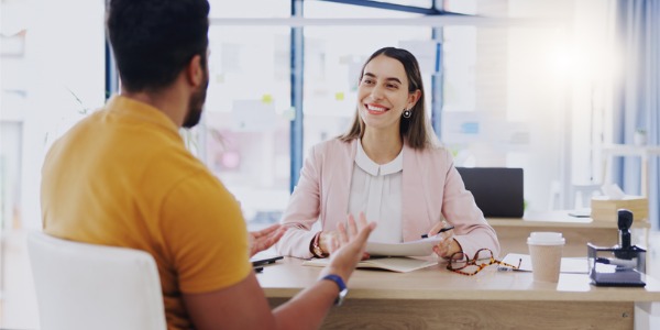 A college and university career counselor helping a student with their career path.