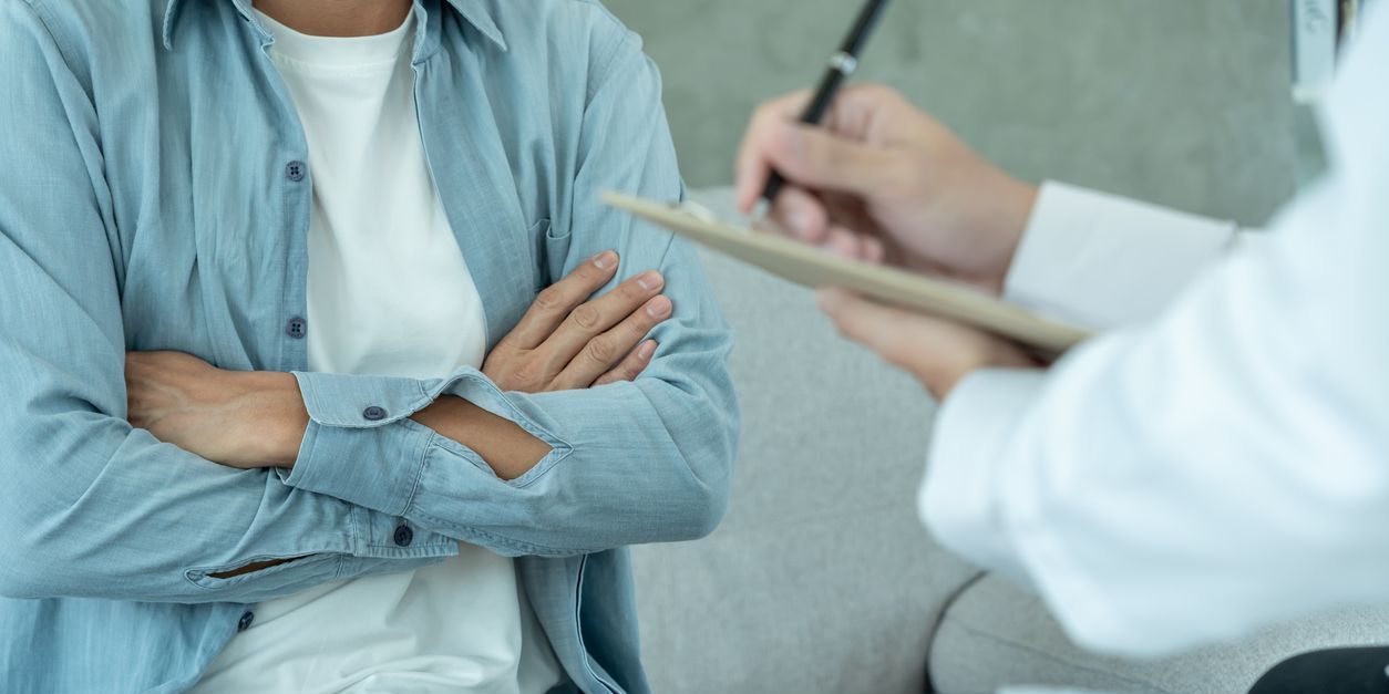 A clinical psychopharmacologist evaluating a patients' mental health conditions.