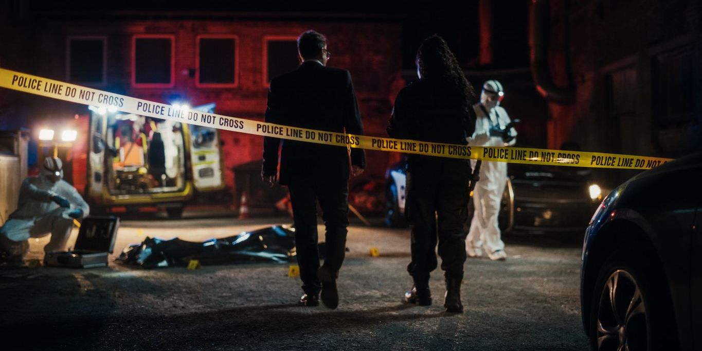 A criminal investigator at a crime scene.
