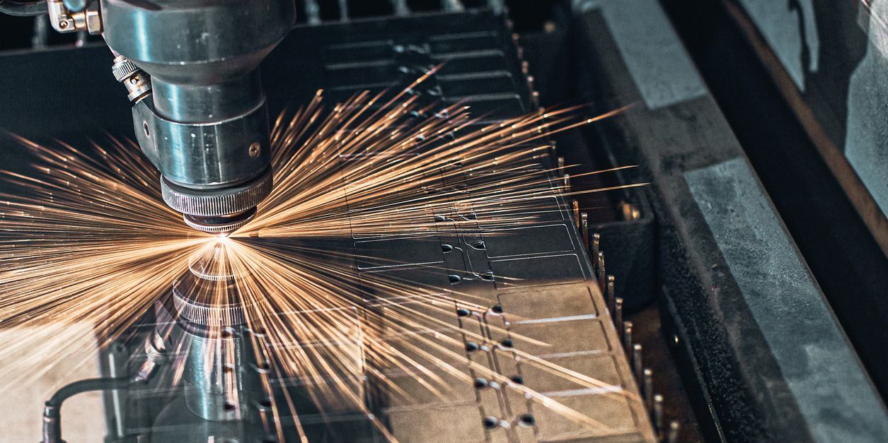 CNC laser cutting of metal close up.