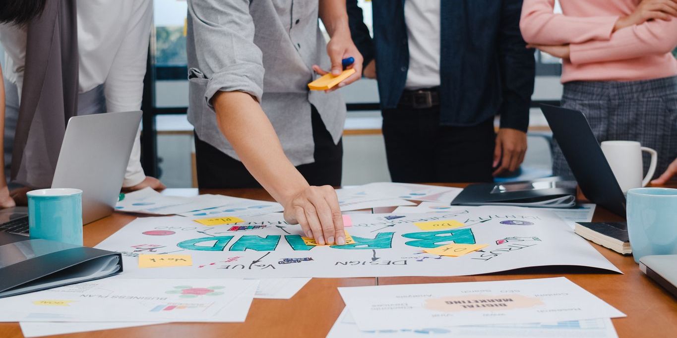 A brand manager brainstorming ideas with the marketing team.