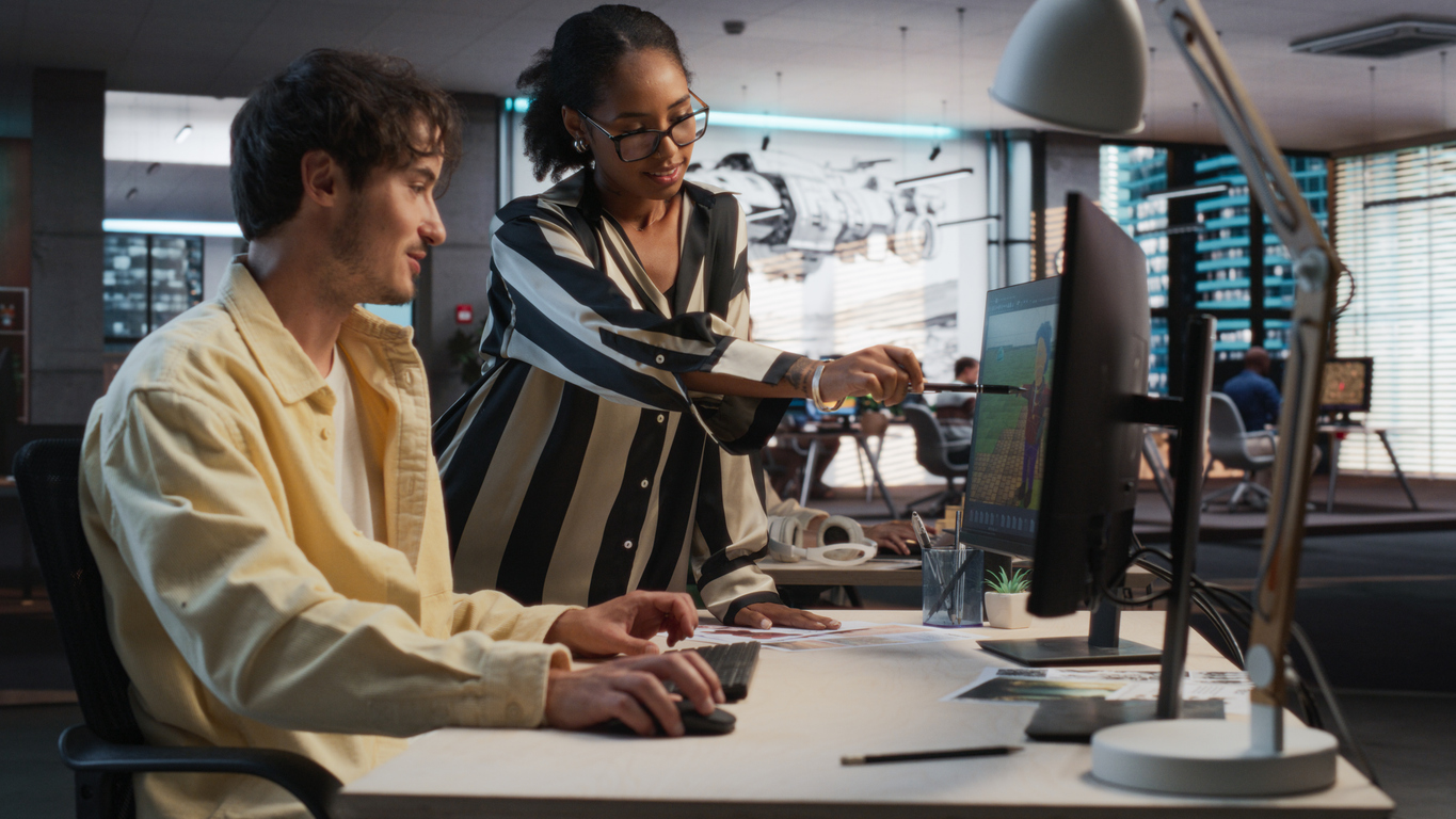 A narrative designer working closely with a game developer.