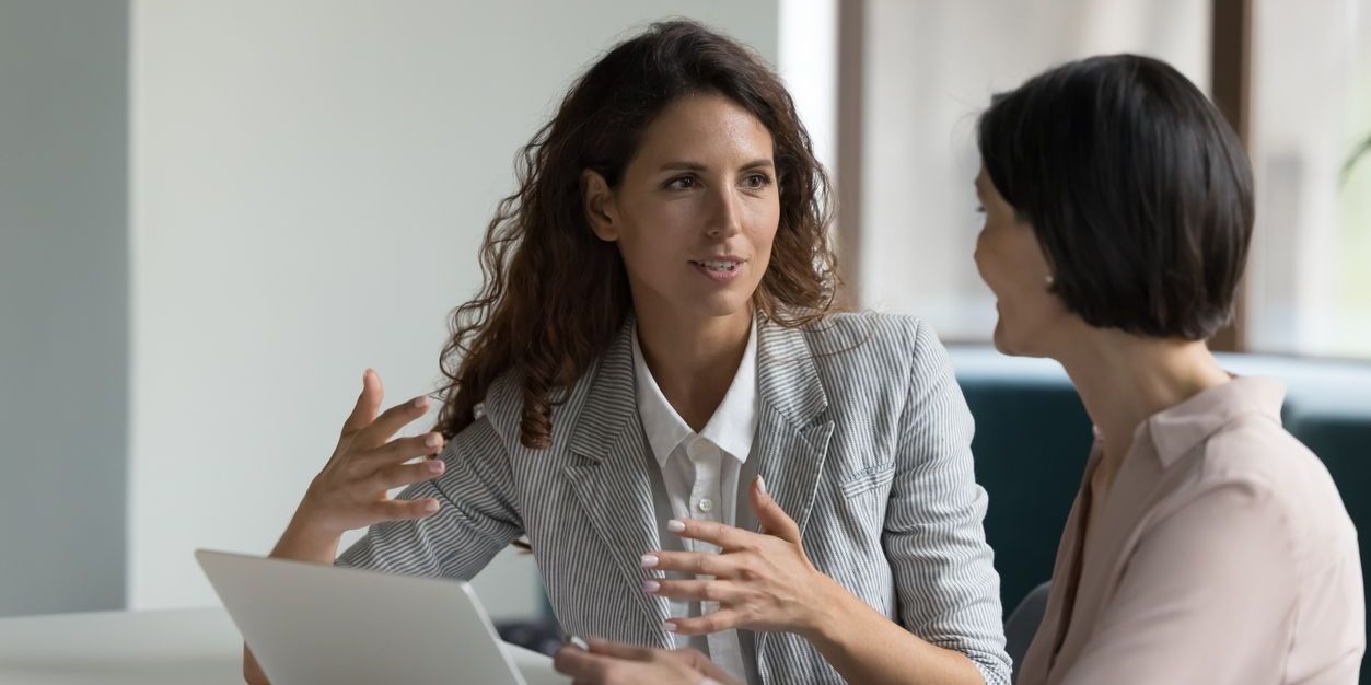 An artistic director going over the overall vision of a production with the director.