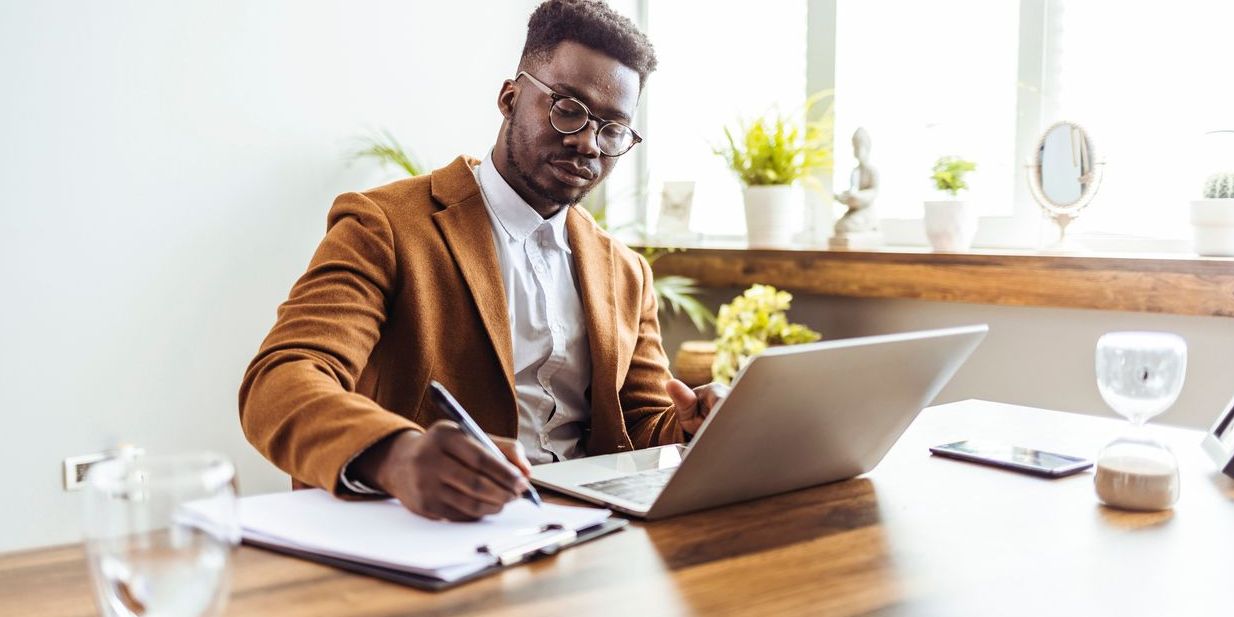 An A&R representative working at his desk.