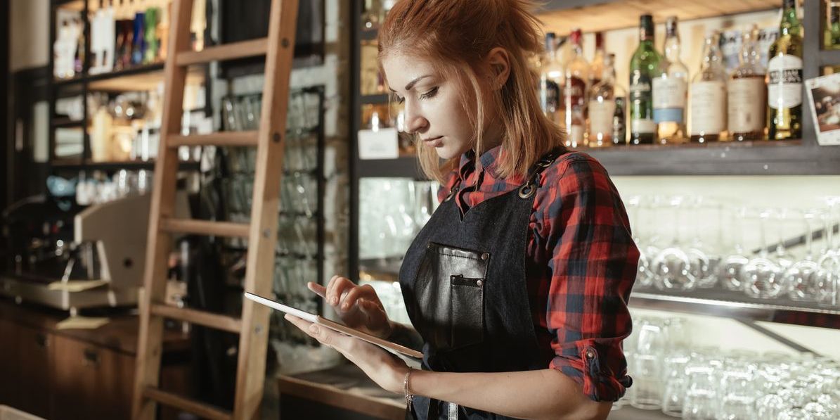 A bar manager managing inventory.