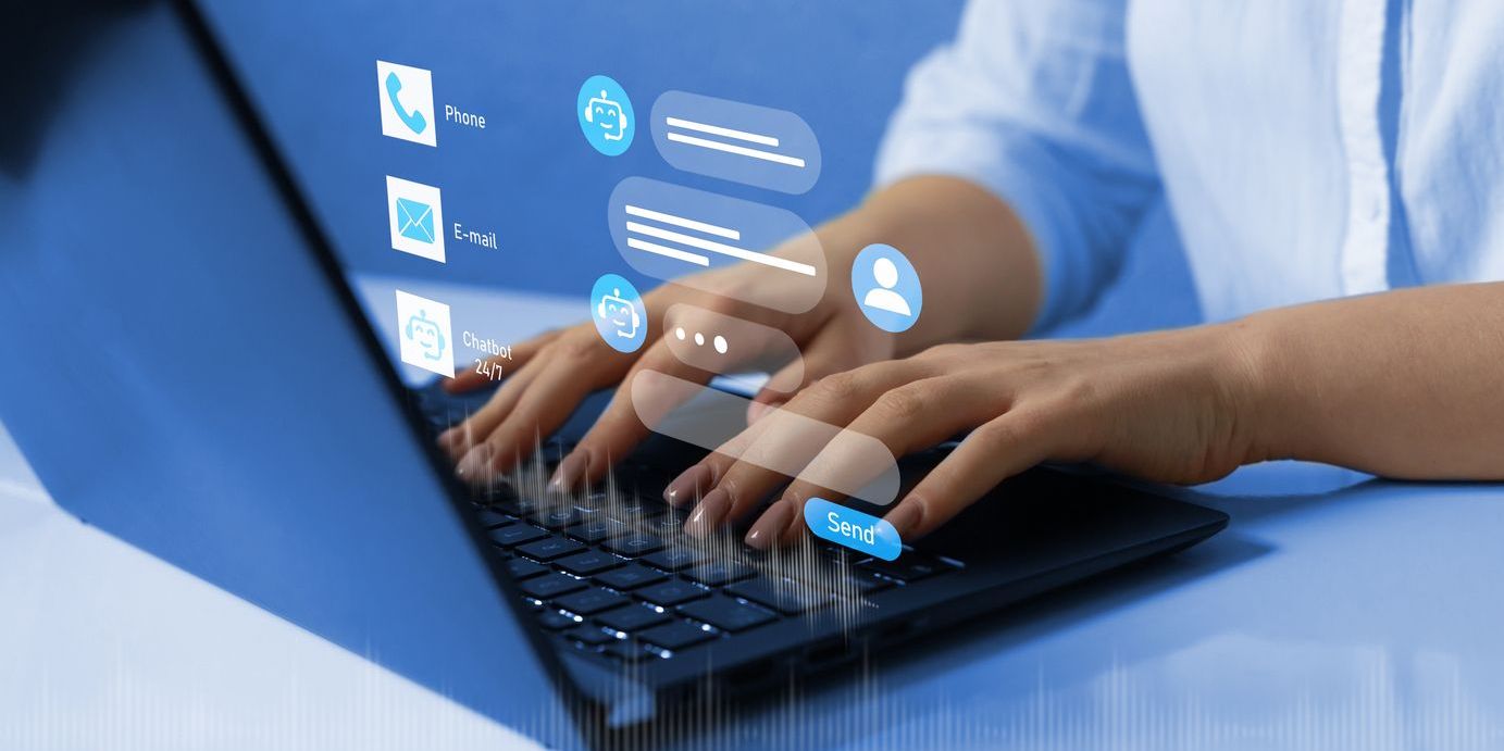 Concept of a social media customer service representative typing on a computer.