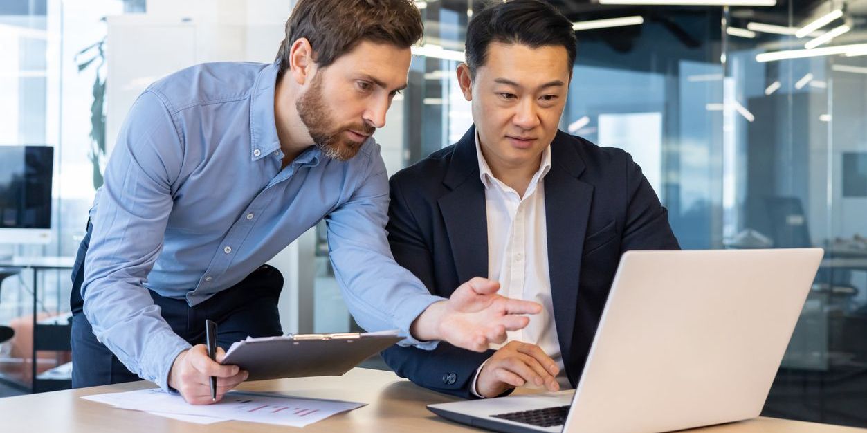 A business consultant talking with a client.