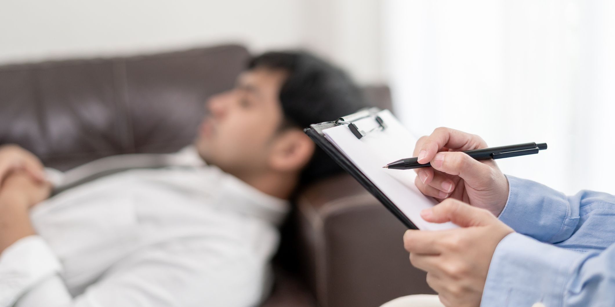 An Ericksonian hypnotherapist conducting a session with a client.