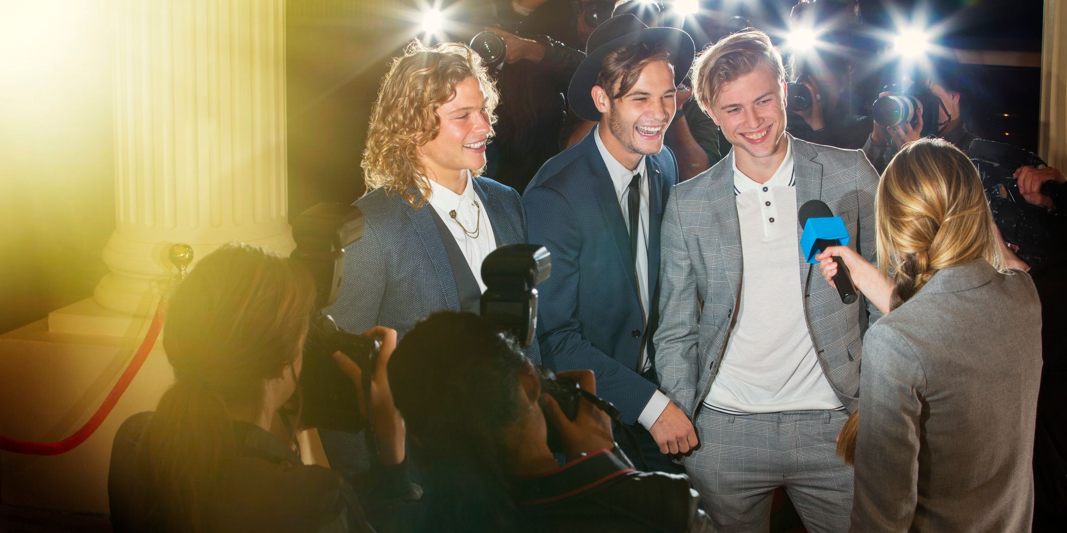 An entertainment reporter interviewing celebrities.