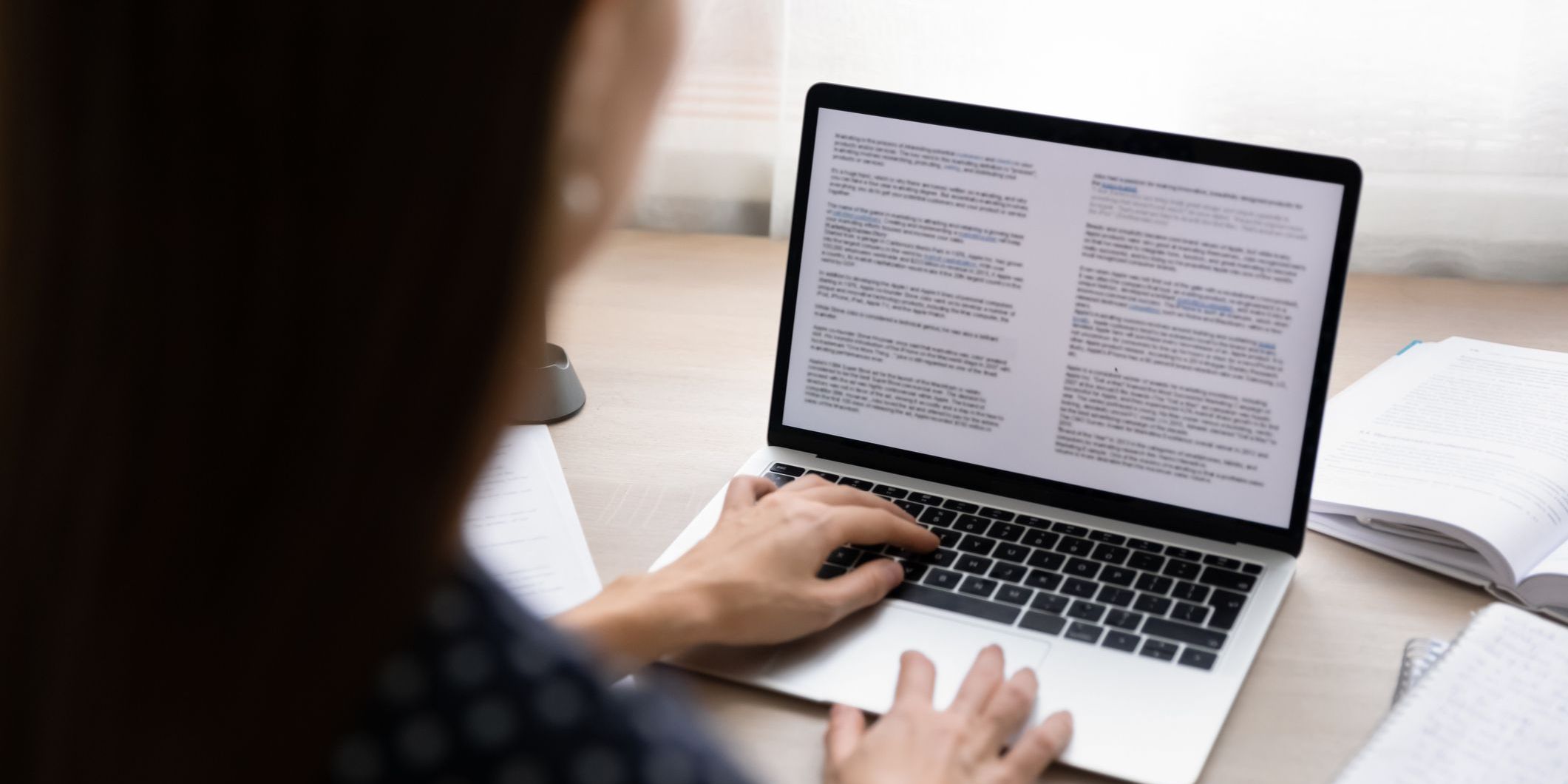 A technical editor reviewing a document to make sure it's clear, accurate, and easy to understand.