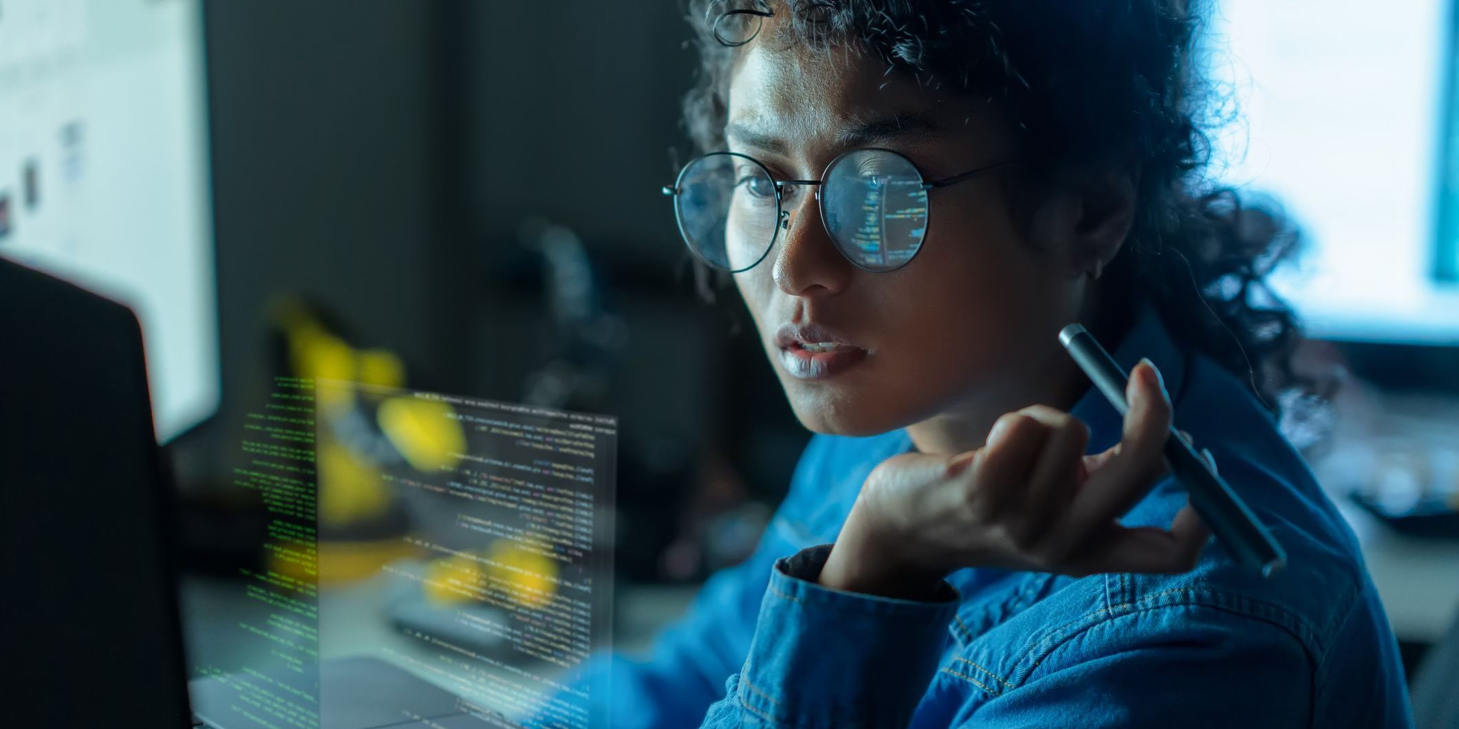 An AI product designer on her computer, creating a product powered by artificial intelligence.