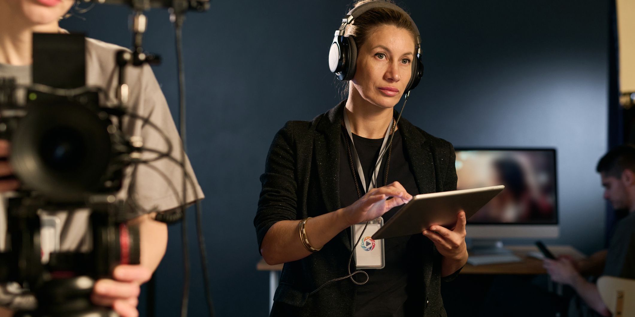 A co-executive producer overseeing the work of different departments so that filming, editing, and other tasks stay on track.