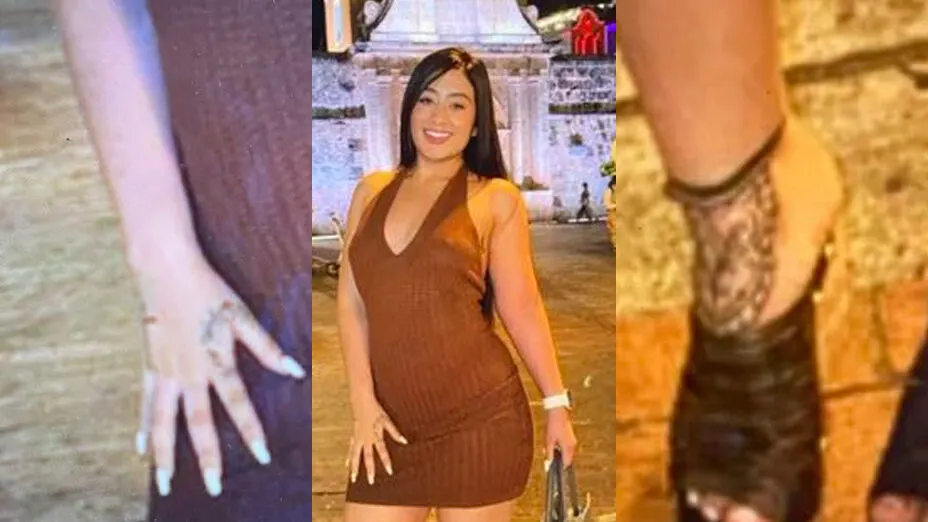 Eine Frau steht lächelnd in einem braunen Kleid vor einem beleuchteten Gebäude in einer nächtlichen Szene.