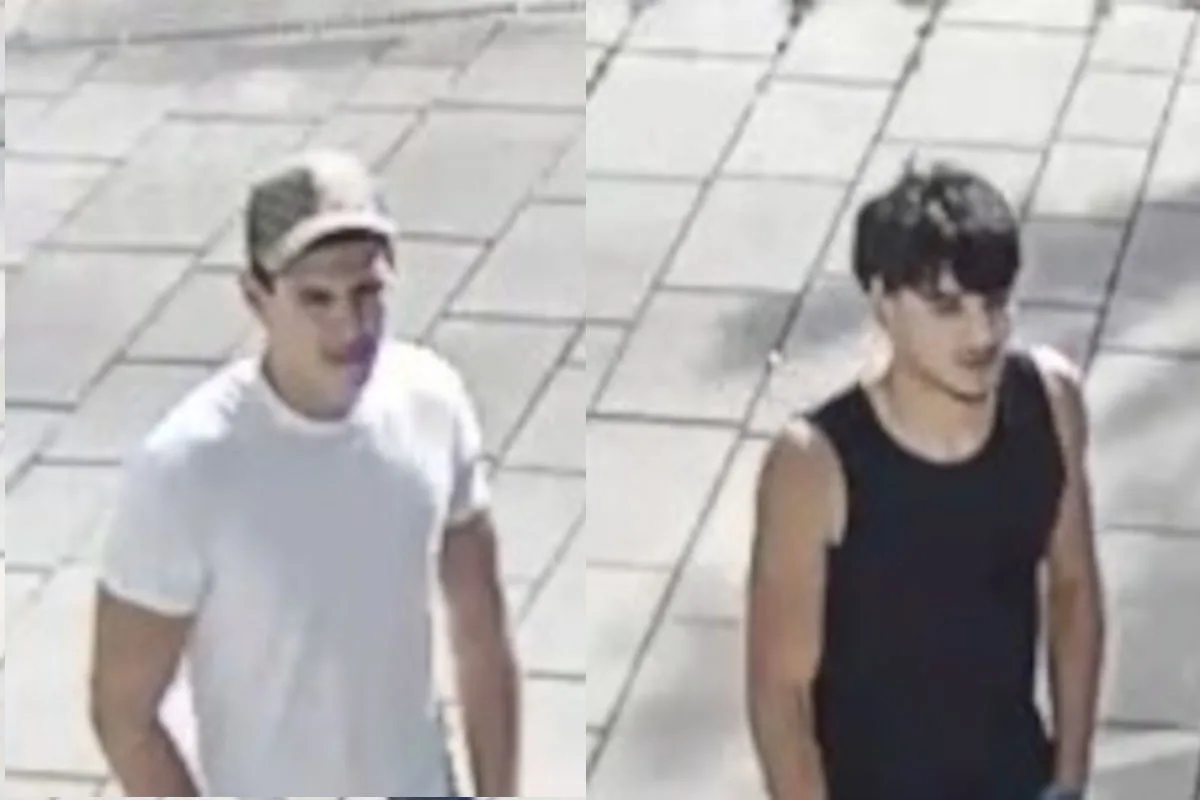 Zwei Männer laufen auf einem Gehweg. Der eine trägt ein weißes T-Shirt und eine Kappe, der andere ein schwarzes Tanktop.
