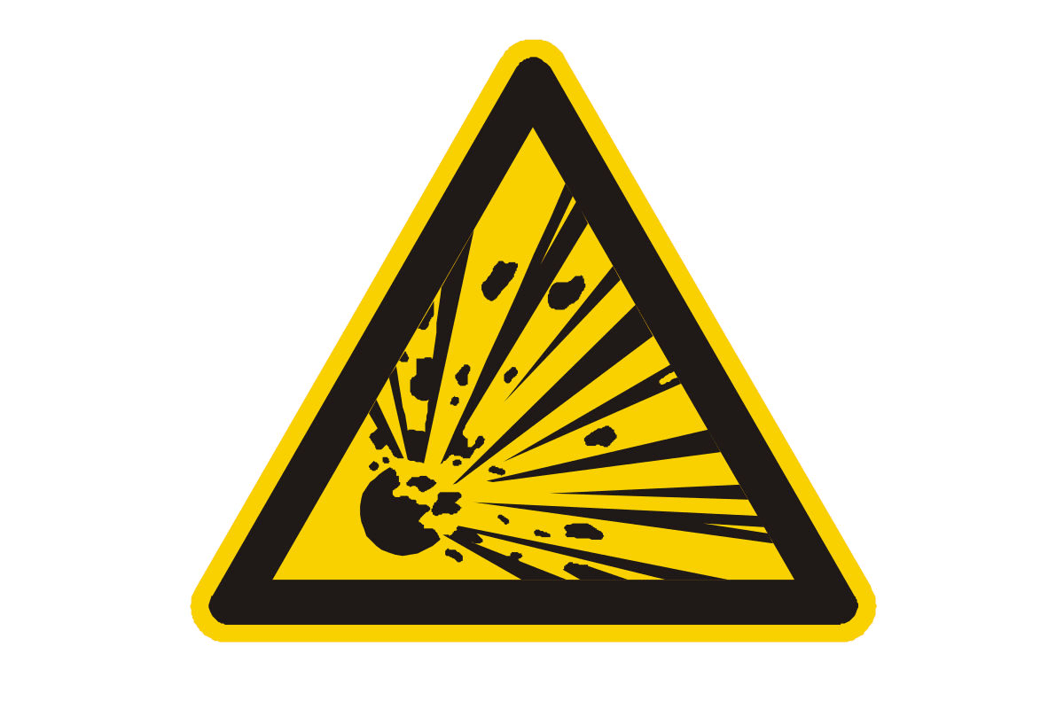 Ein dreieckiges, gelbes Warnschild mit einem schwarzen Rahmen zeigt ein Symbol für eine Explosion in der Mitte.