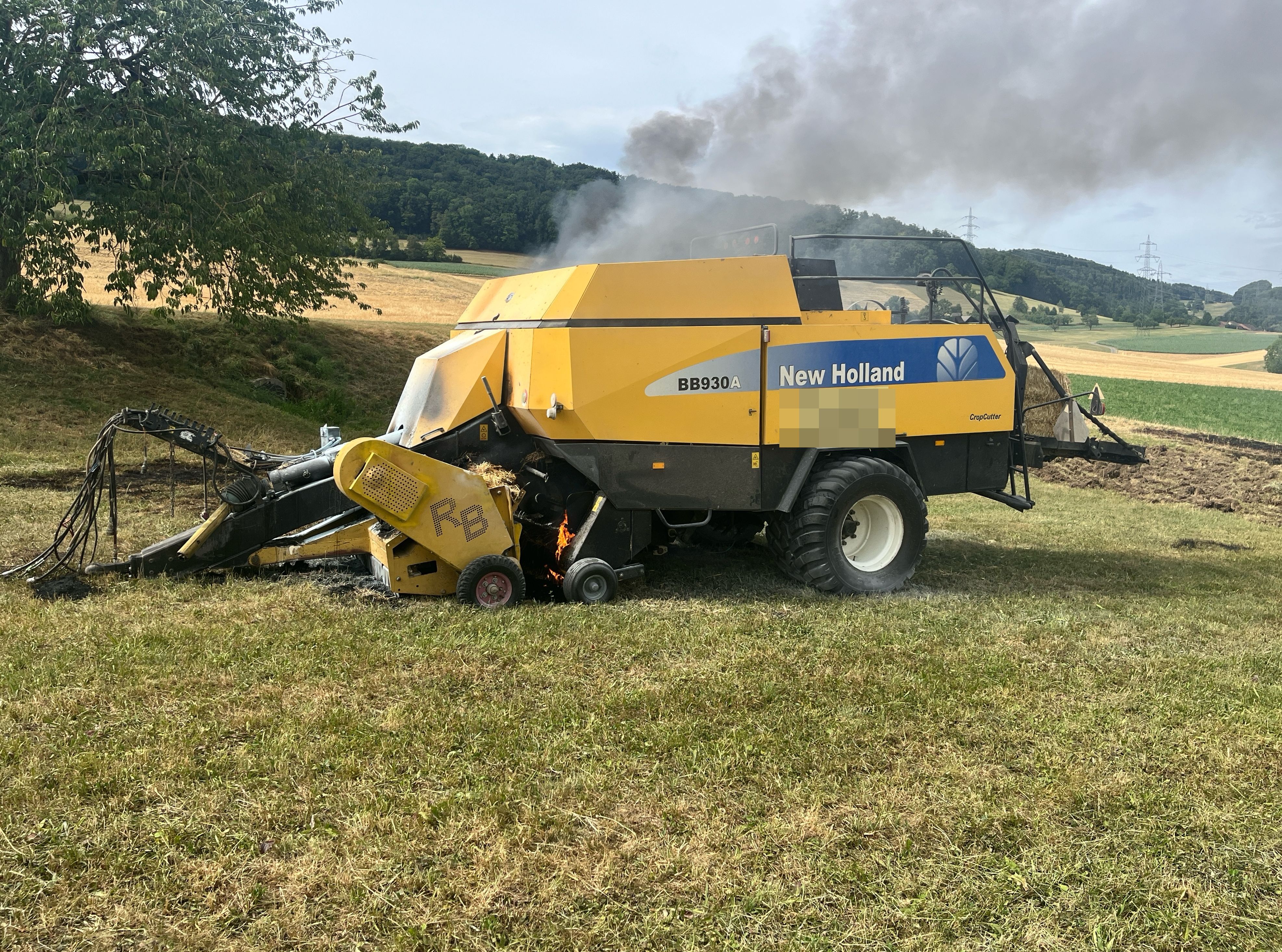 Brennende Ballenpresse