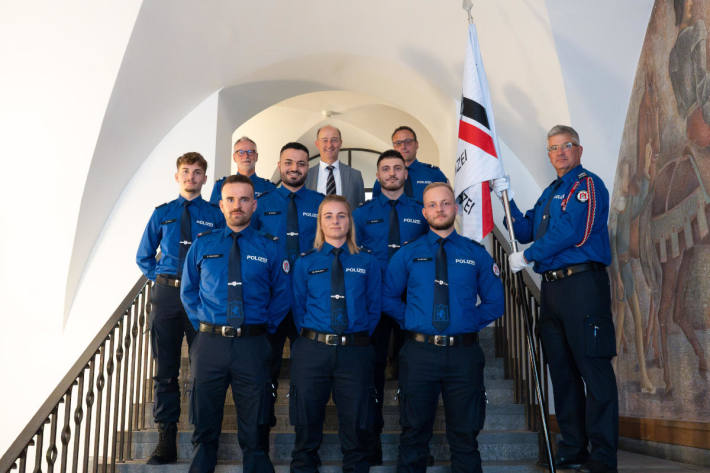 Polizisten und Polizistin in Ausbildung der Stadtpolizei Chur.