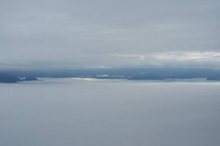 Flug oberhalb der Wolken nach Luzern