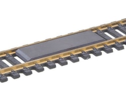 HO Delayed Uncoupler Between Rails photo