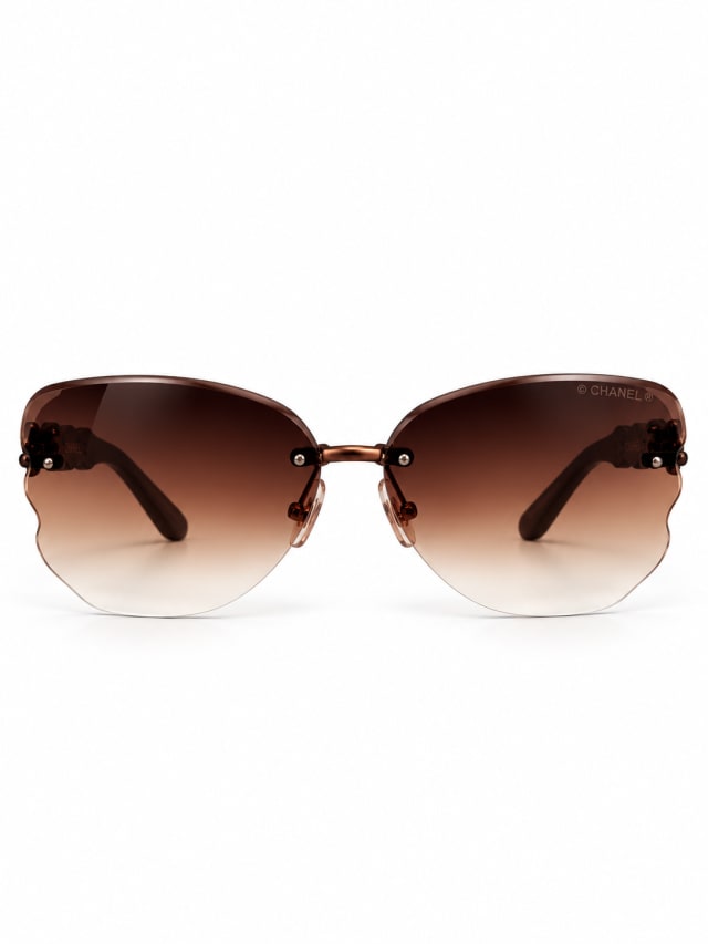 CHANEL BROWN RIMLESS WOOD-TEMPLE SUNGLASSES