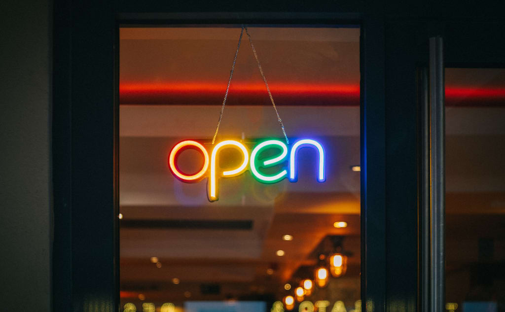 open-sign-viktor-forgacs-unsplash