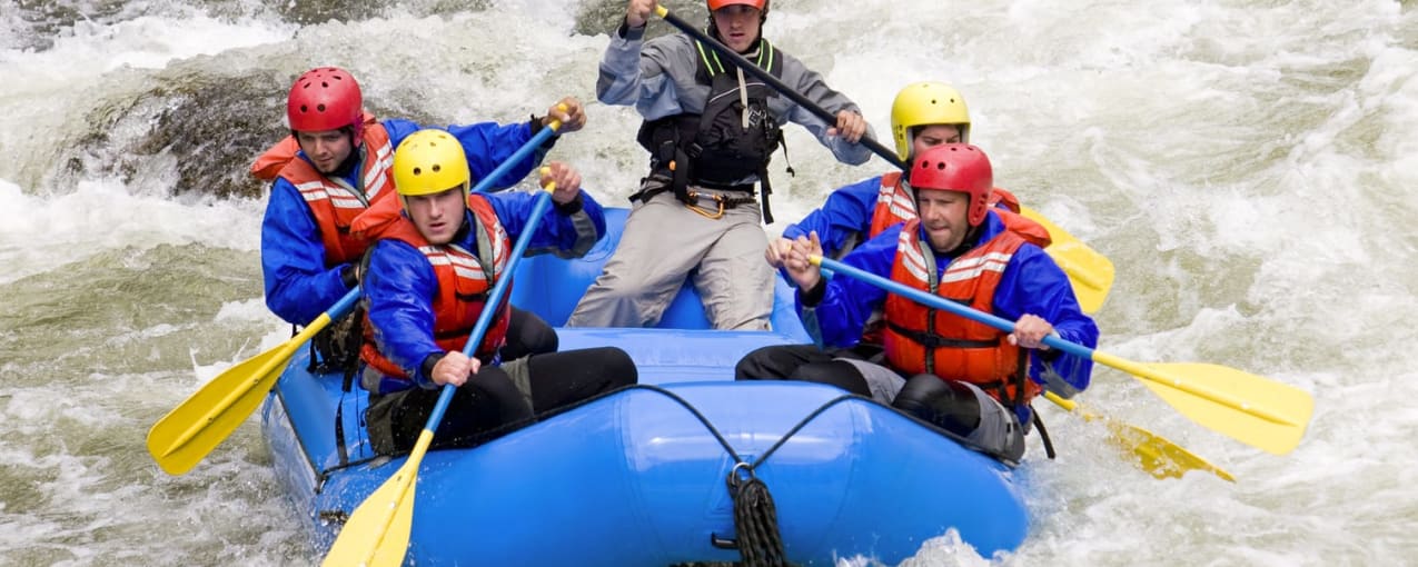 Raft down Grade 5 rapids