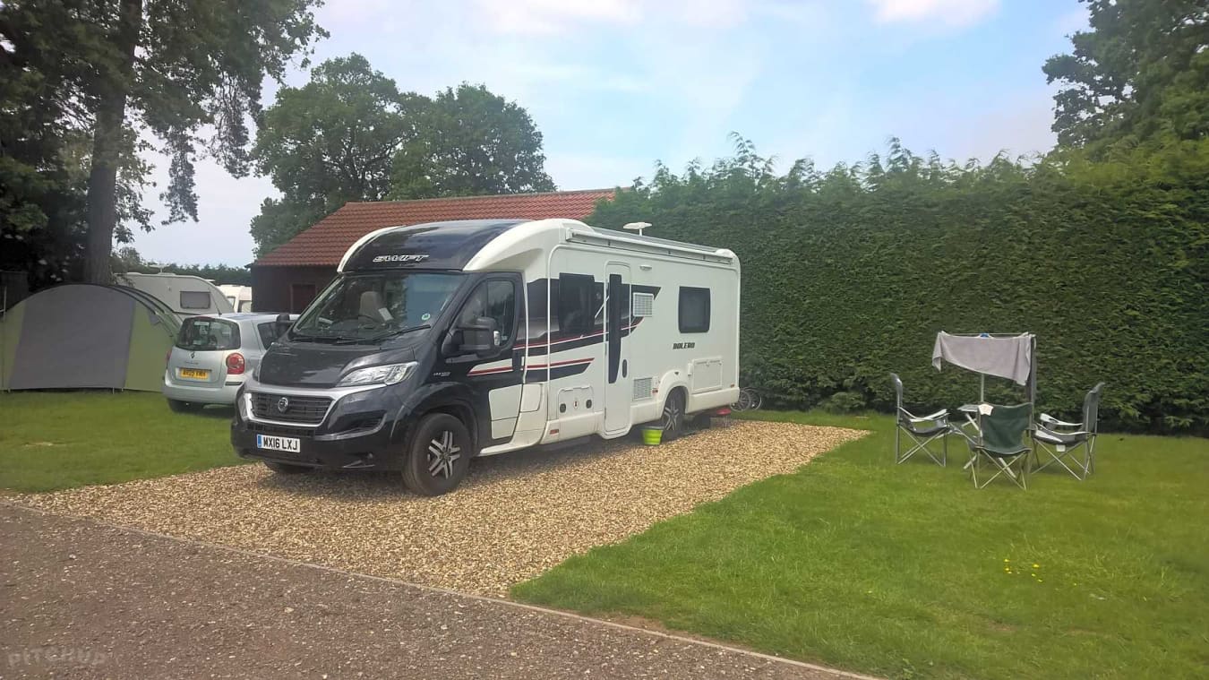 Electric grass and gravel touring pitch