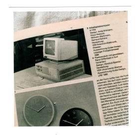 Foto von einer alten Zeitschrift, in der ein alter Computer abgedruckt ist 