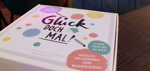 Box zum Release Event Glück doch mal