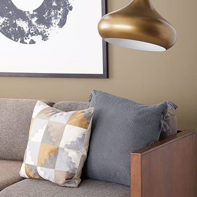A large solid color 22" and a large pattern 20" fill the corner of this Bench. You could do the same with a large chair
