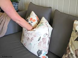image shows how to chop a throw pillow when decorating a home using throw pillows