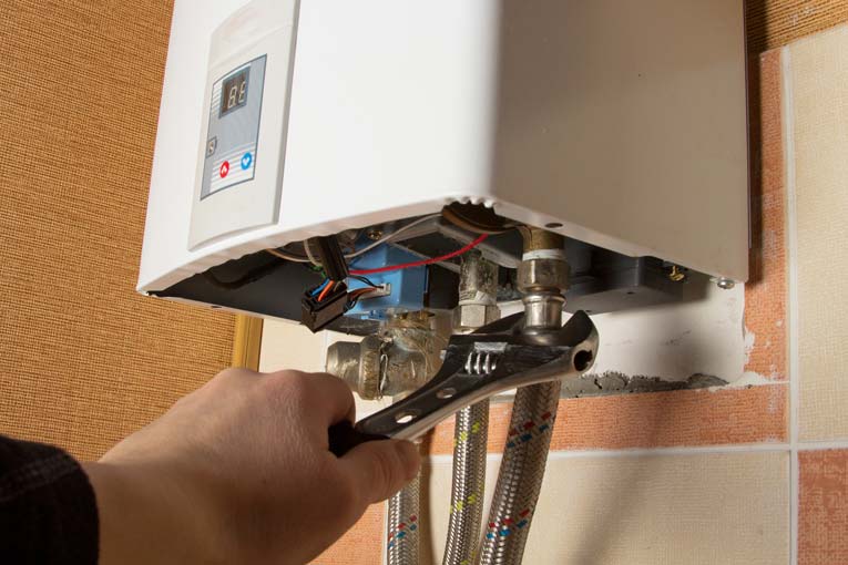 Installing a gas tankless water heater involves mounting the unit, connecting gas and water lines, and installing a flue.