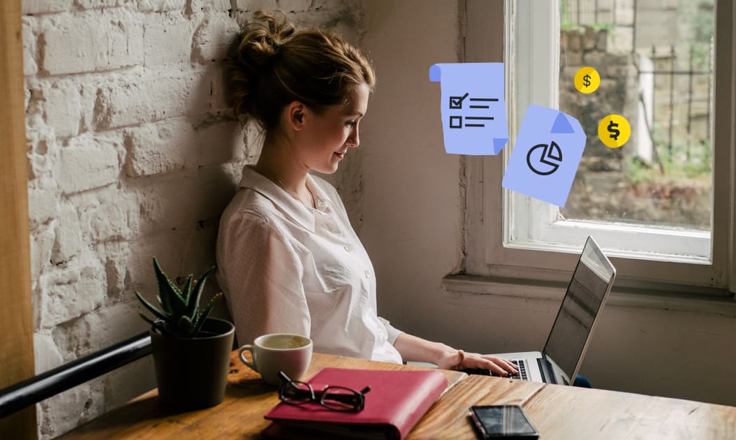 A woman against a wall on her laptop conducting a business financial health check