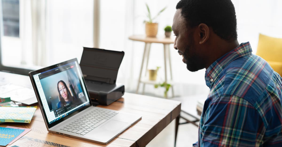 Man interviewing a woman for UGC lead generation