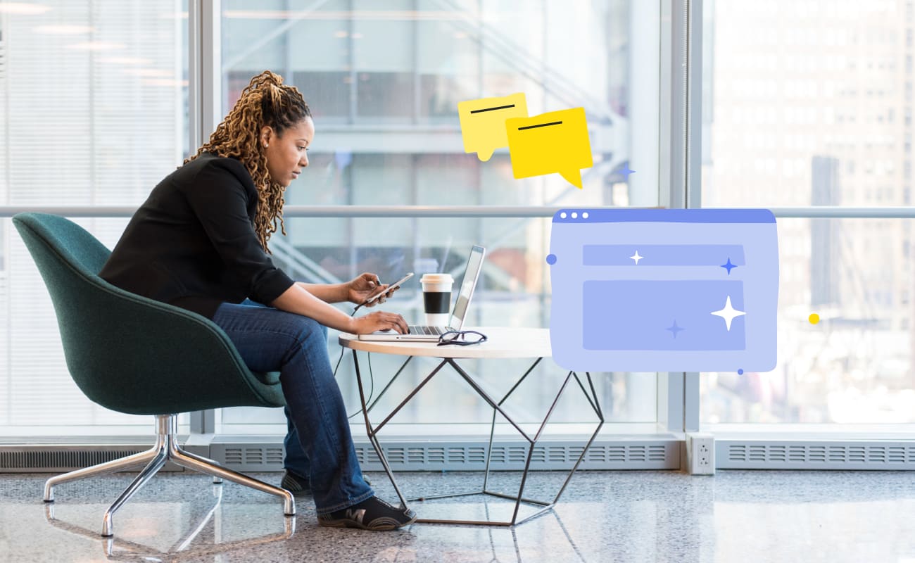 Woman sitting and managing her brand experience on a laptop