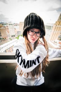 Jessica posing with her skymint merch.