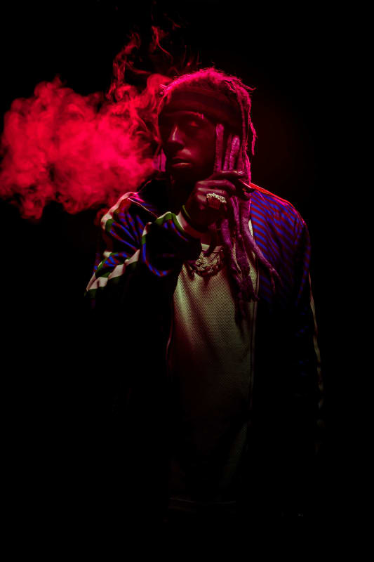 I’m a Business, Man: Lil Wayne Lights Up His Own Lane