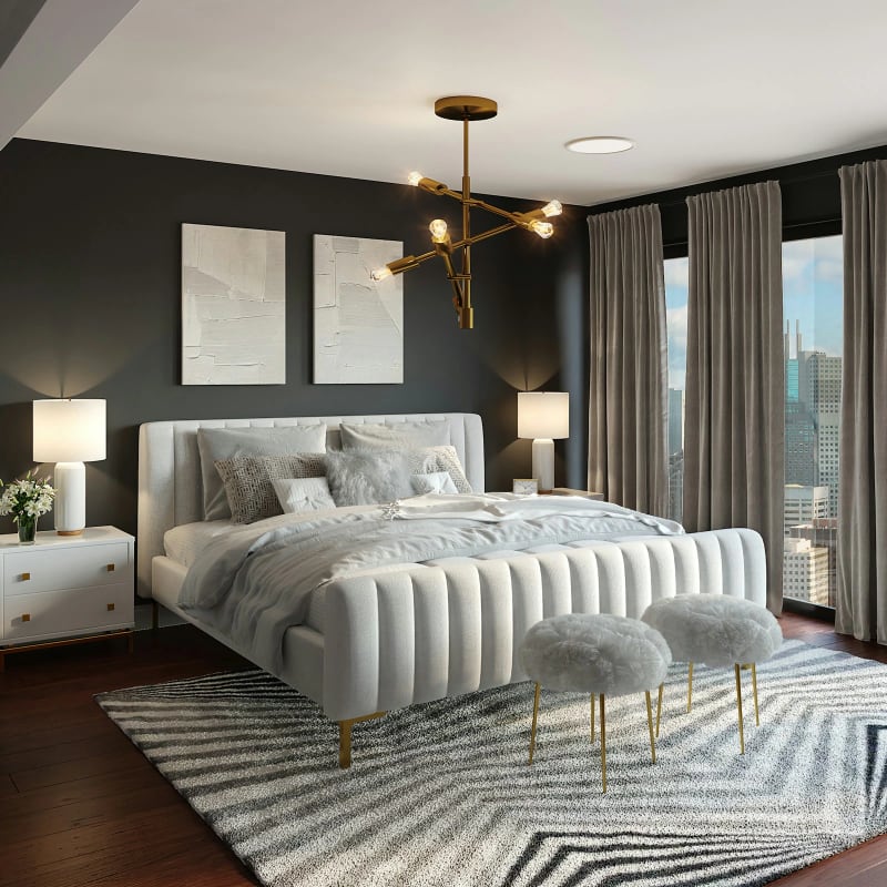 Chambre rénovée aux tons chauds et luminaire doré