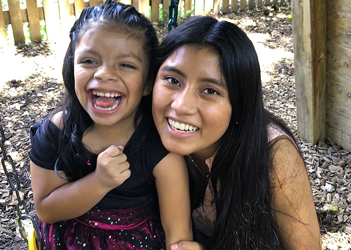 two girls laughing