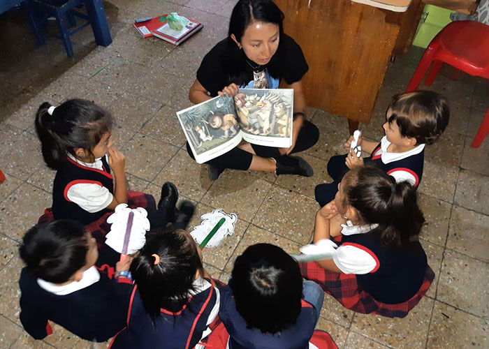 teacher reading to children