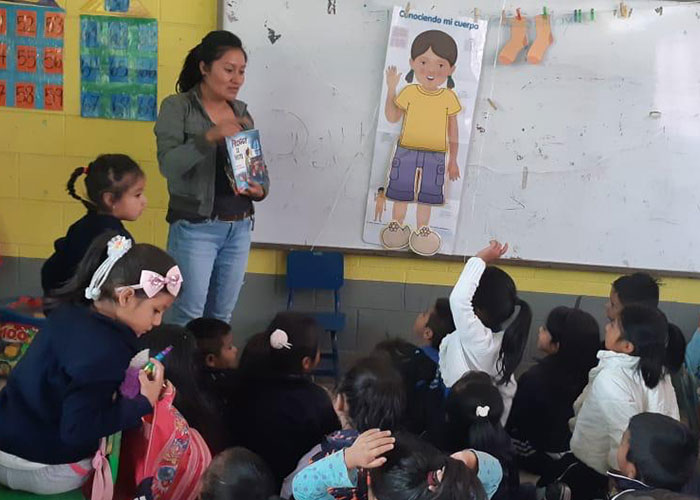 teacher reading to children