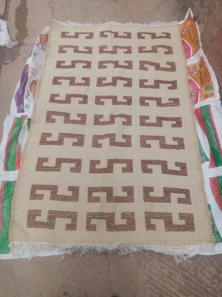  A rug  Brown, White Morocco