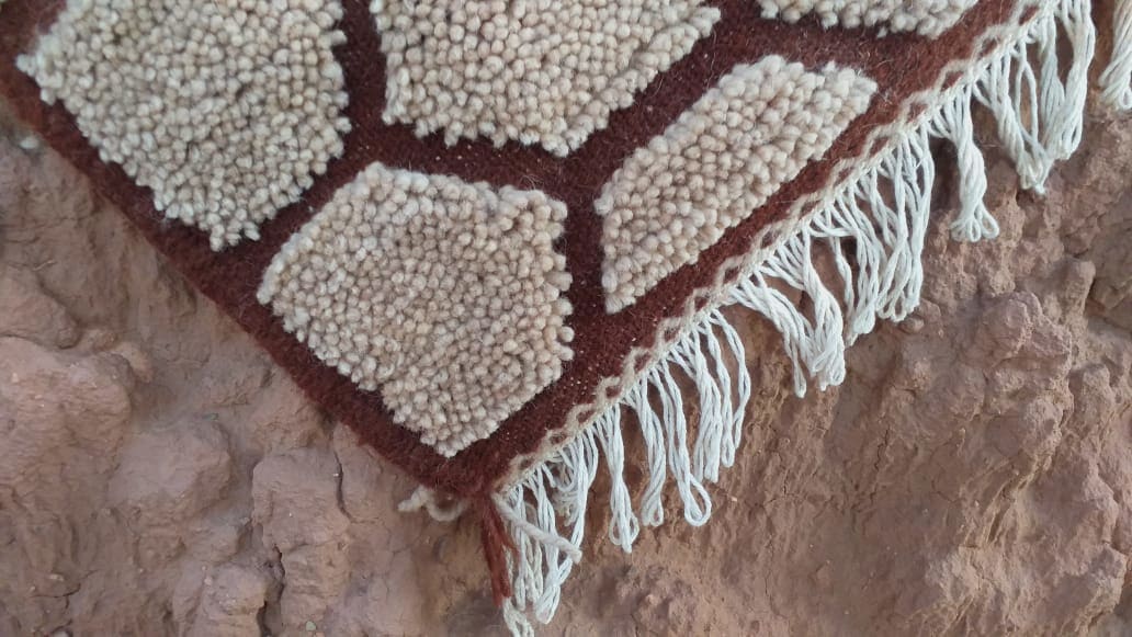 Flatweave and Pileknot rug