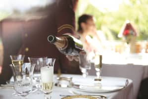 Champagne being poured on board the Northern Belle