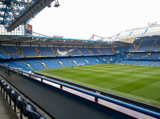 VIP padded match seat in the West Stand middle tier near the half-way line