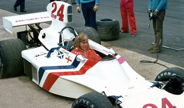 F1 legend James Hunt driving a white Hesketh