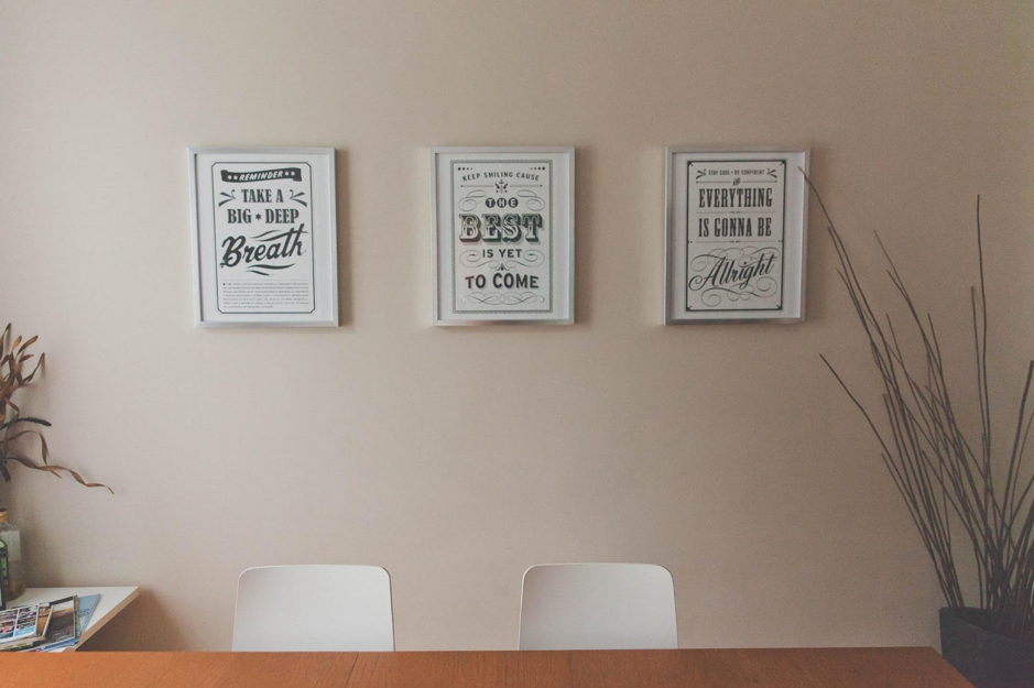 Motivational Posters on the back of a white wall Motivational Posters on the back of a white wall