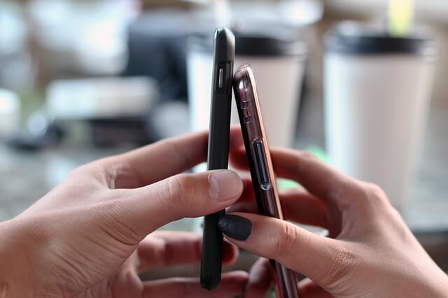 Two phones connected together. Two phones connected together.