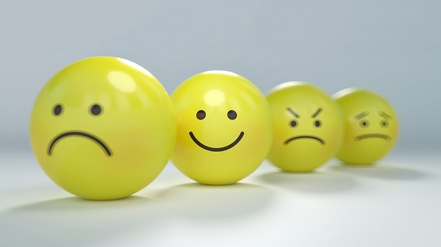 a line of emoji faces. a line of emoji faces.